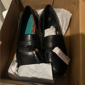 Black Loafers with Tassel Detail